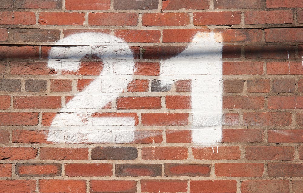 21 painted on the side of a building
