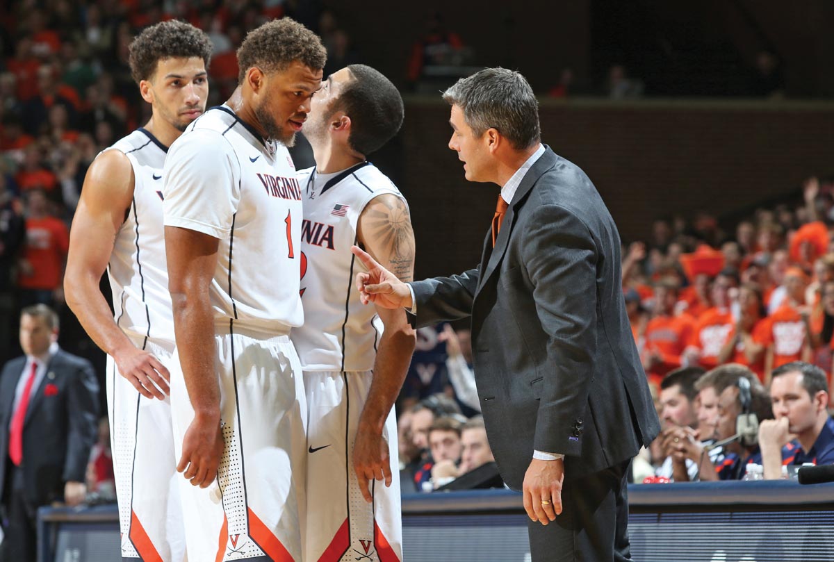 Coach Tony Bennett with players Anthony Gill, Justin Anderson, and London Perrantes