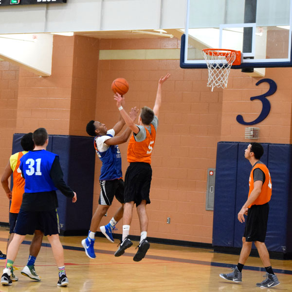 Students playing basketball