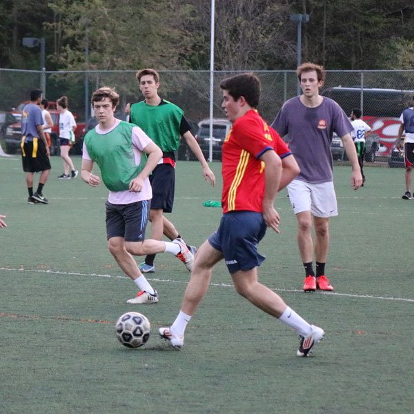 Students playing soccer