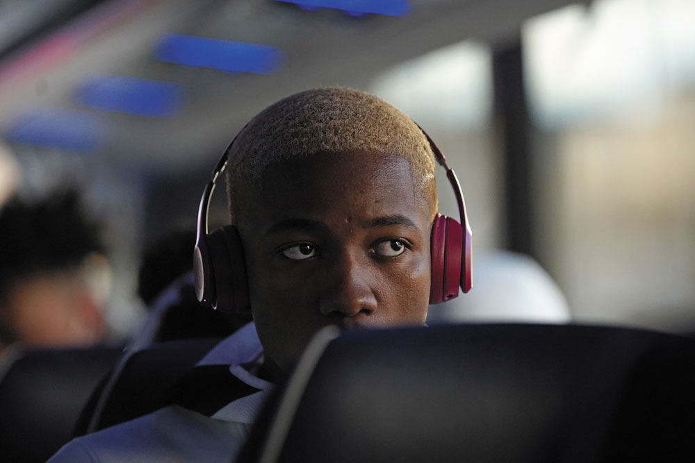 Redshirt junior Mamadi Diakite on the team bus