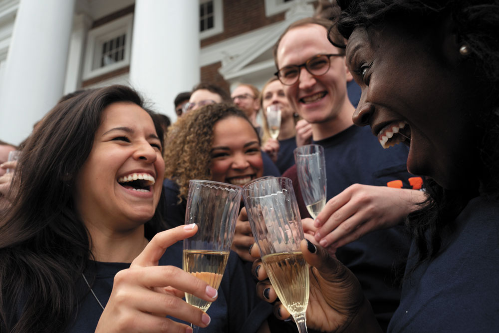 Brielle Gerry and Mackenzie Sullivan celebrate with Med School classmates.