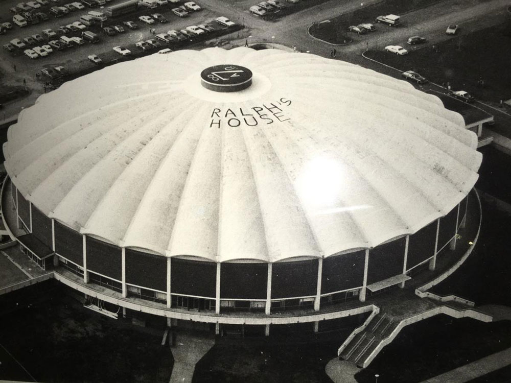 The roof of University Hall with “Ralph’s House” painted in 8-foot-long letters