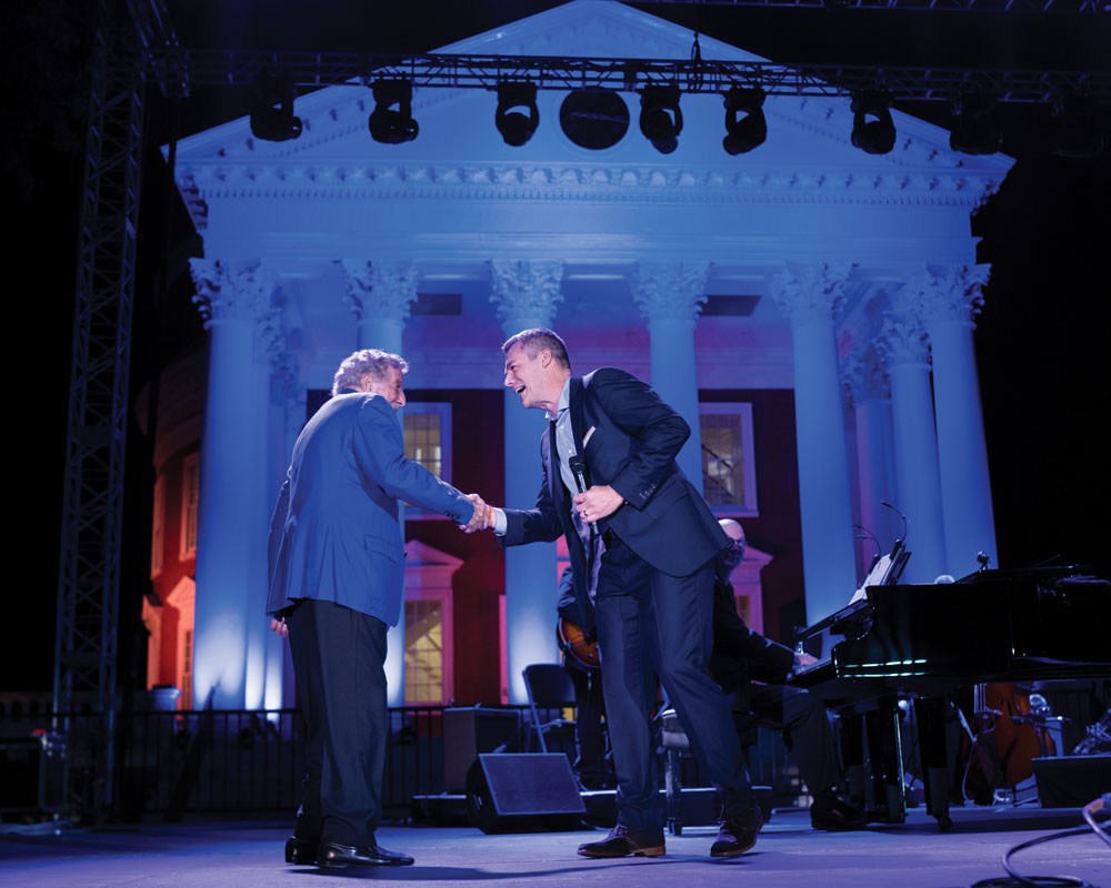 Men’s basketball coach Tony Bennett shaking hands with the singer Tony Bennett