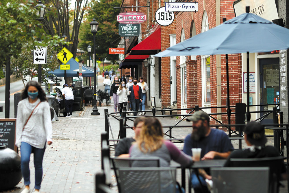 The UVA Corner, where some businesses are surviving but others have been hit hard during the pandemic.