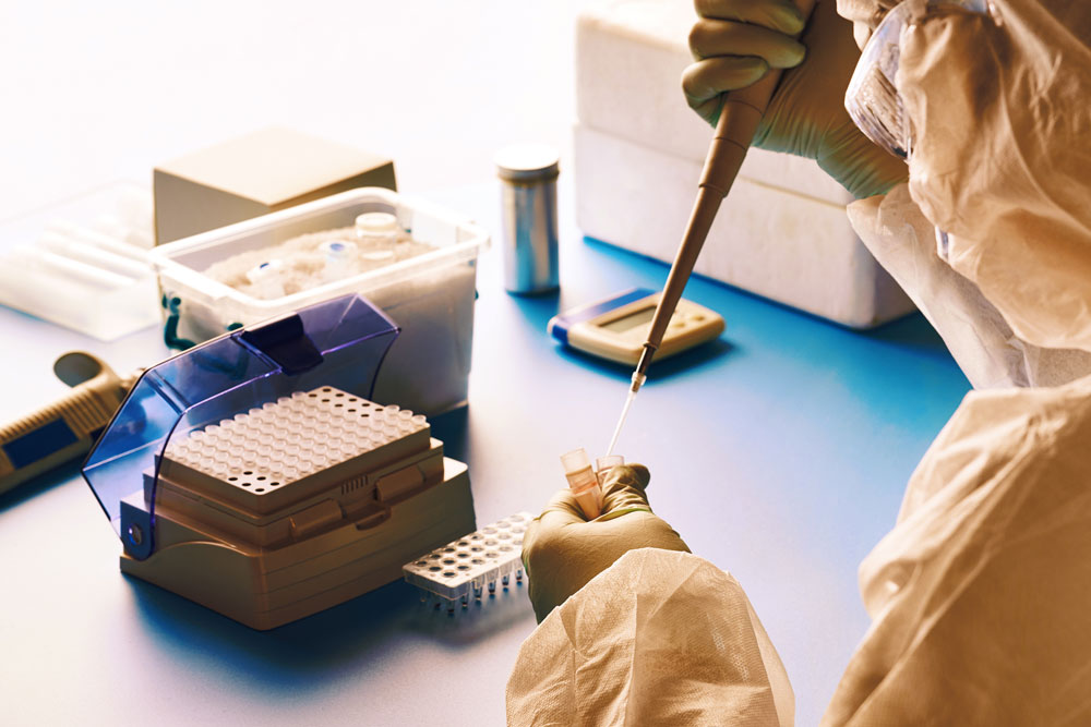 A researcher fills a test tube