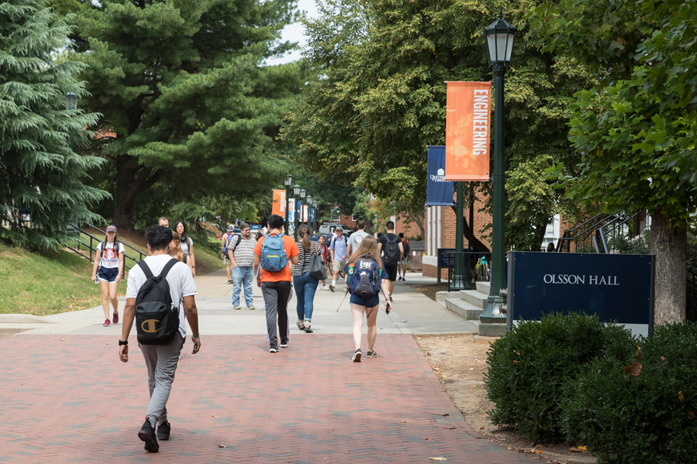 Students walking by Olsson Hall