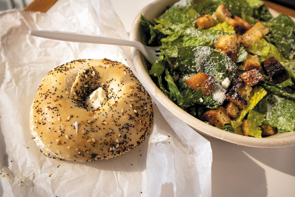 A Bodo’s everything bagel and Caesar salad