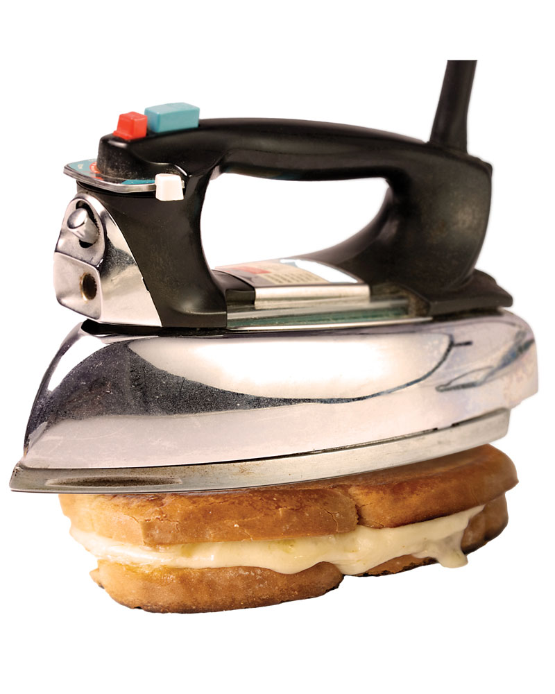 A grilled cheese sandwich cooked by an iron