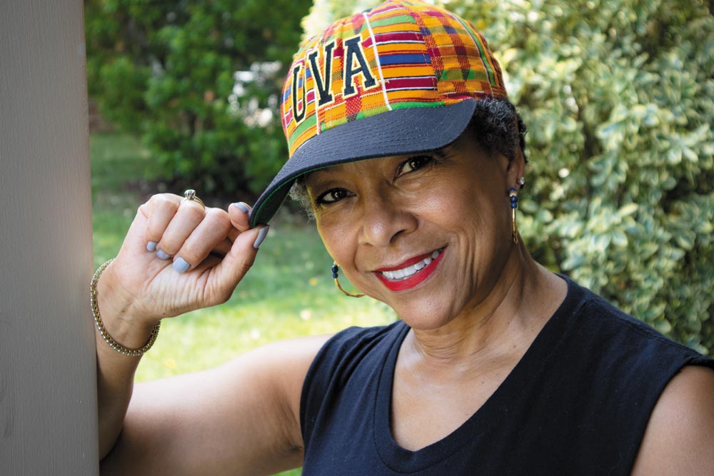 Yolanda Burrell Taylor wearing her African print UVA hat