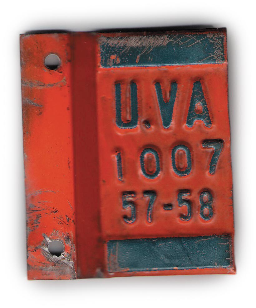 A vintage metal parking tag