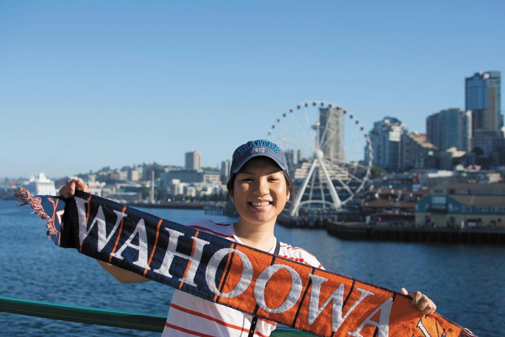 Jenna Truong posing with her 'Wahoowa' scarf