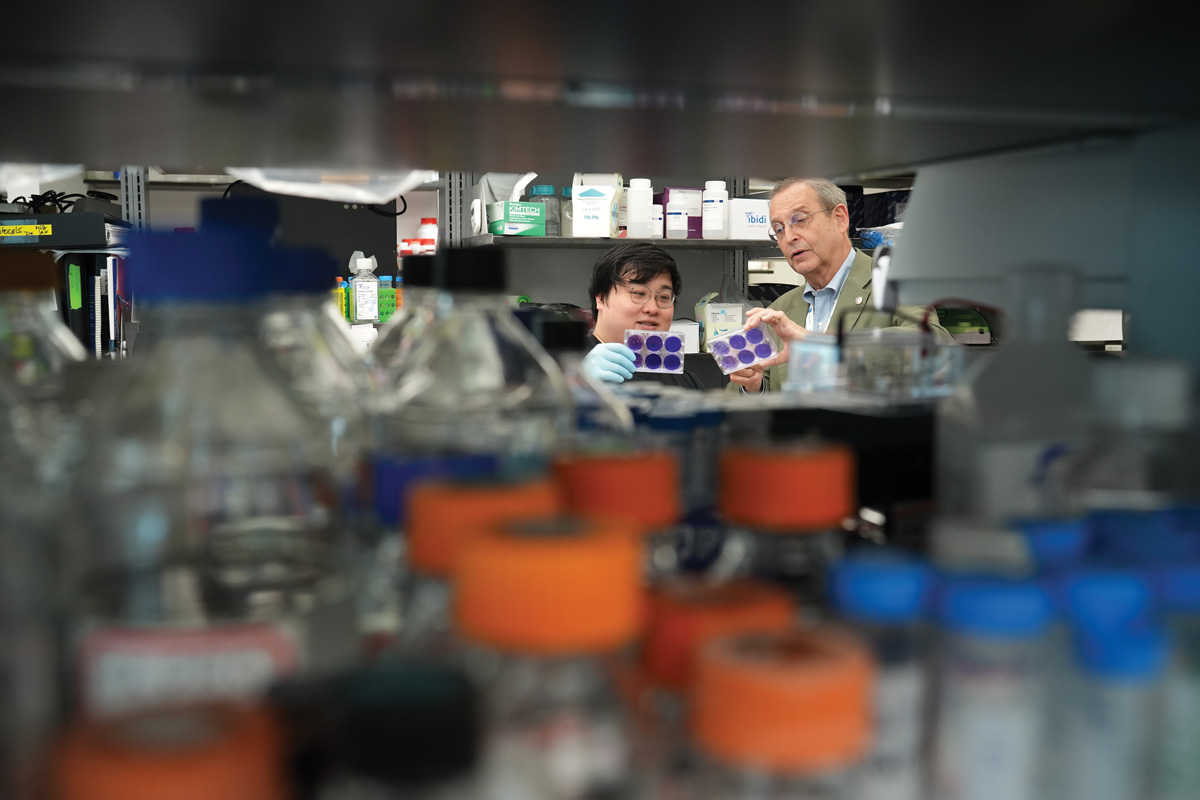 Microbiology, immunology and cancer biology department chair Mariano Garcia-Blanco and researcher Evan Lam