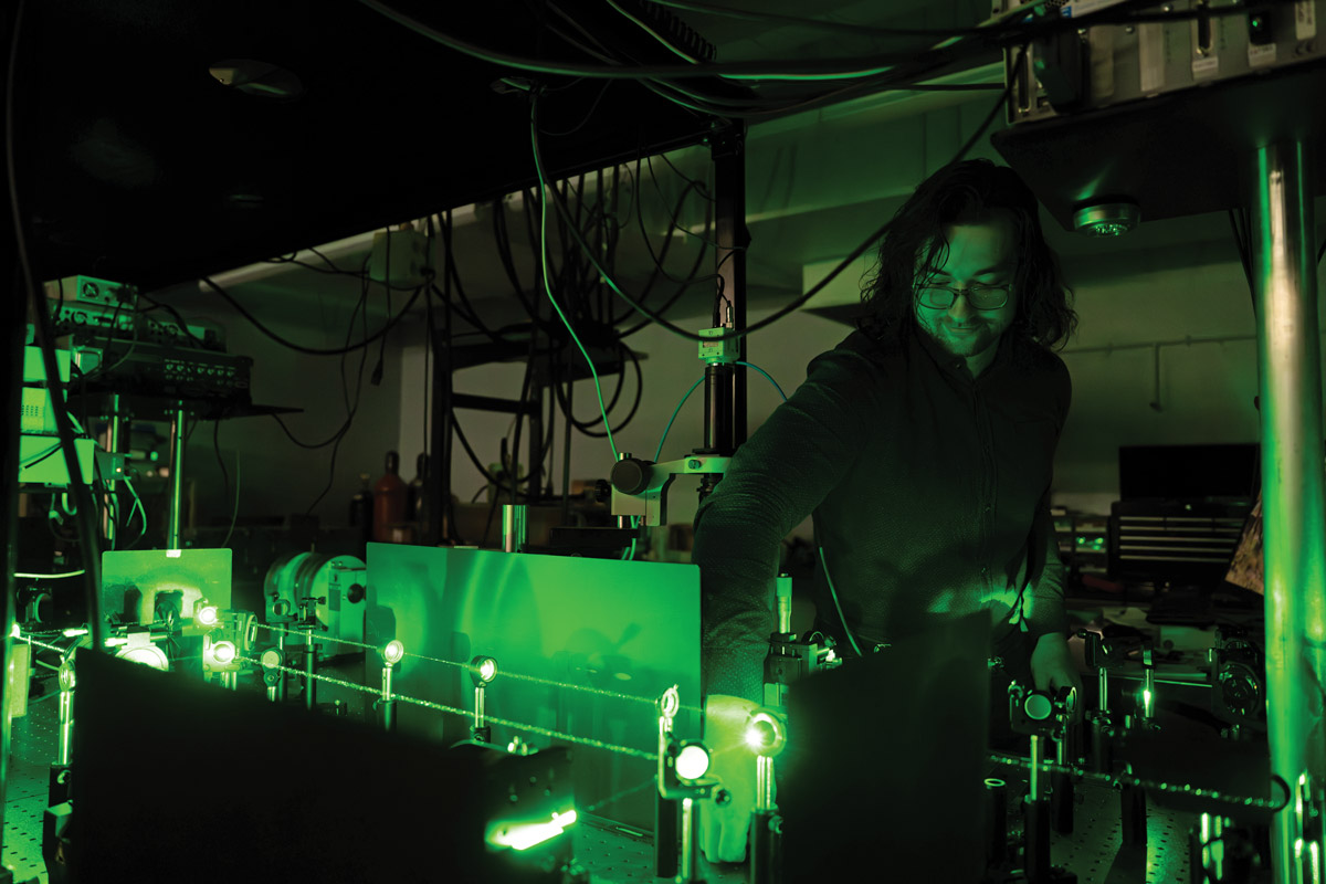 Will Hutchins uses a laser 