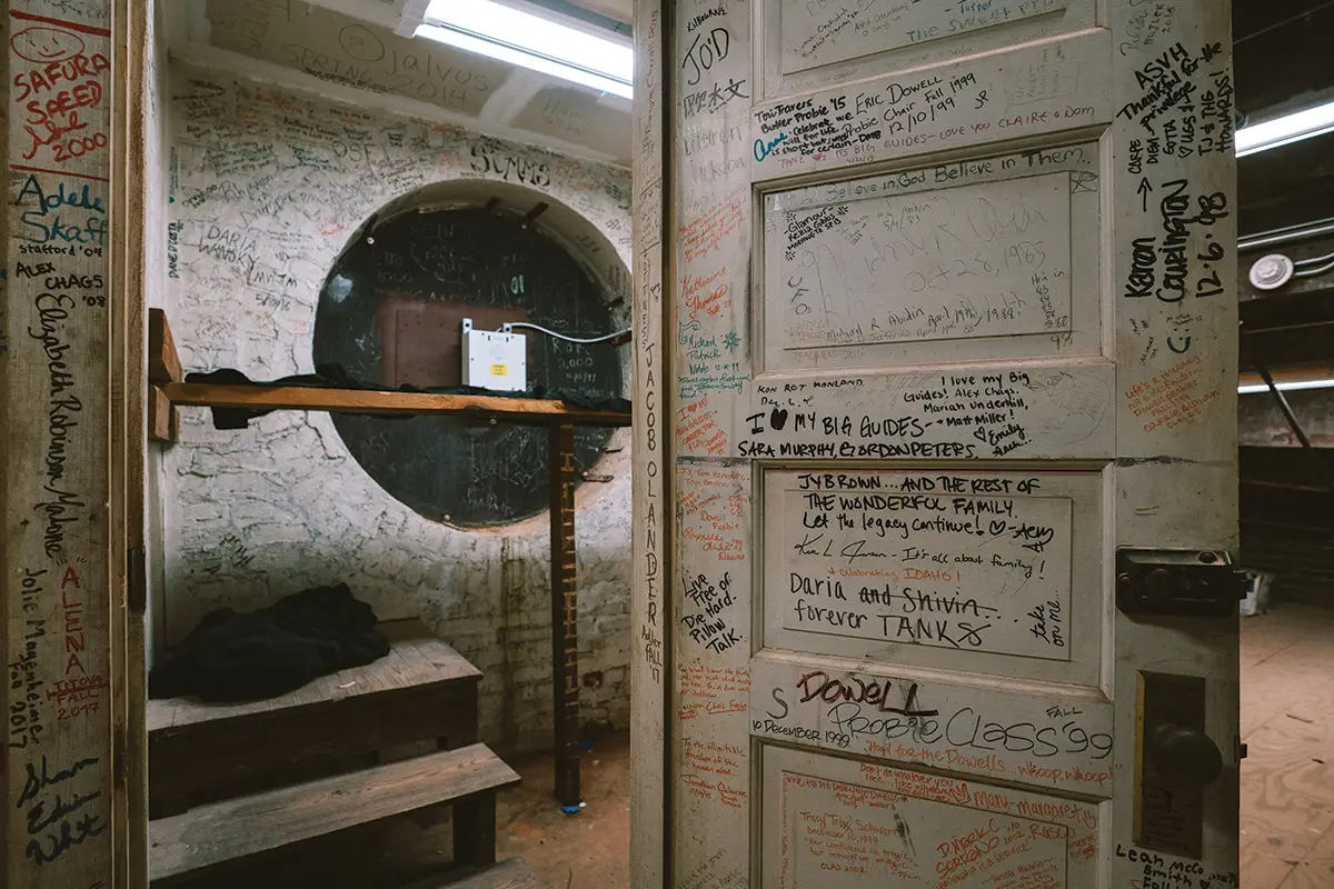 Writing on the walls of an attic inside the UVA Rotunda